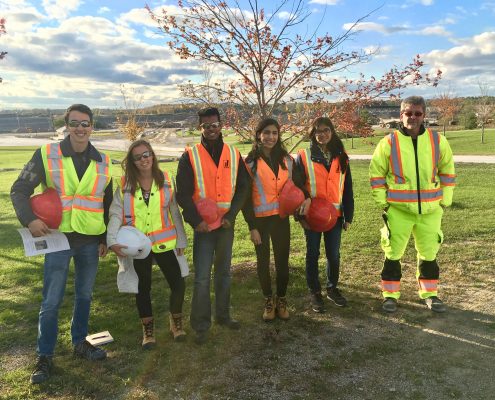 employee site visit with Mac students