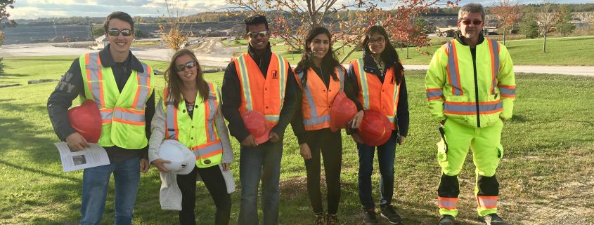 employee site visit with Mac students